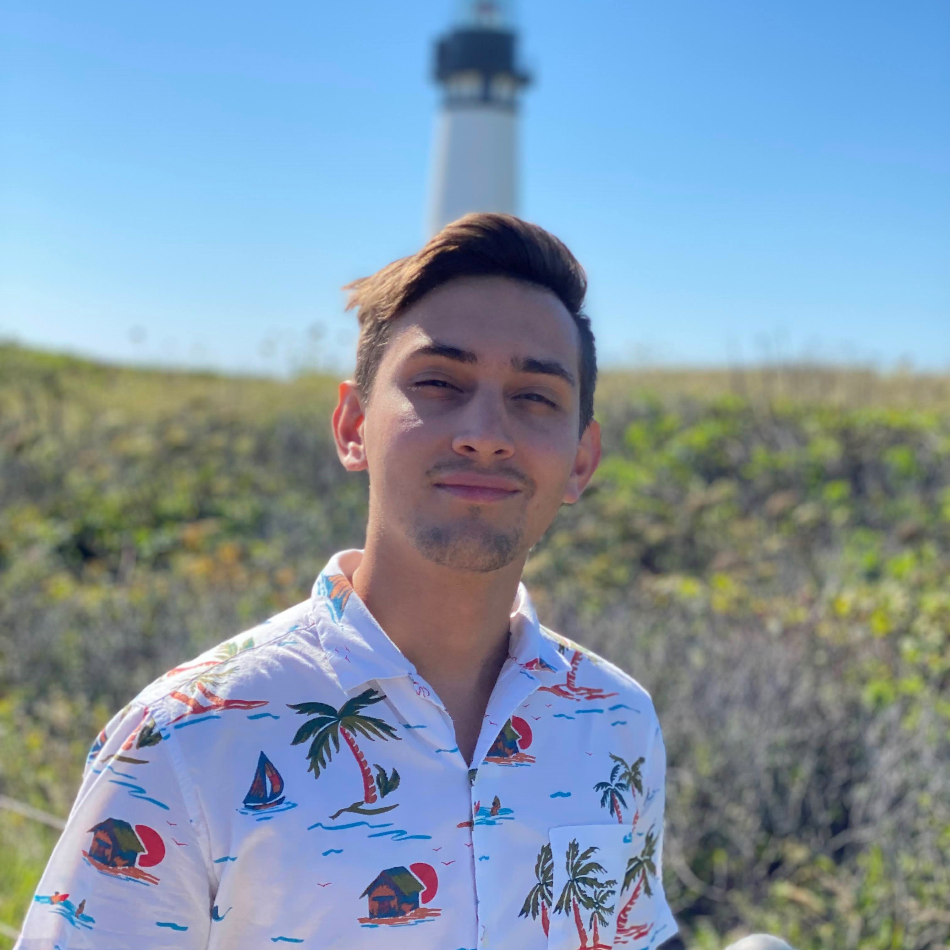 Picture of Tim standing at a great open field.